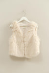 Luxuriously soft faux fur open vest in a creamy beige tone, perfect for layering in Long Island boutique fashion.