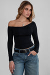 One-shoulder asymmetrical black long-sleeve top that flatters with a fitted silhouette, perfect for Long Island boutique fashion.