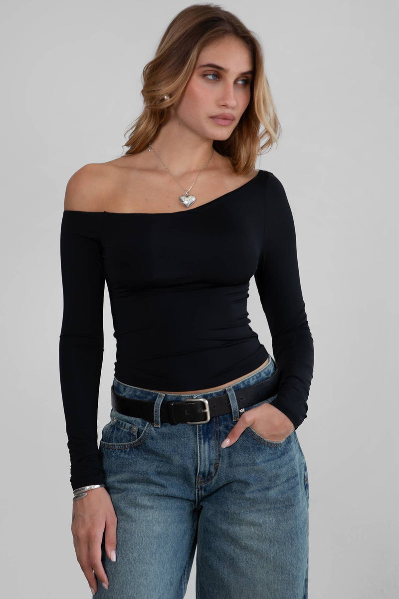 One-shoulder asymmetrical black long-sleeve top that flatters with a fitted silhouette, perfect for Long Island boutique fashion.
