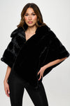 Luxurious black faux fur capelet featuring a cozy high collar and relaxed fit, perfect for Long Island boutique fashion enthusiasts.