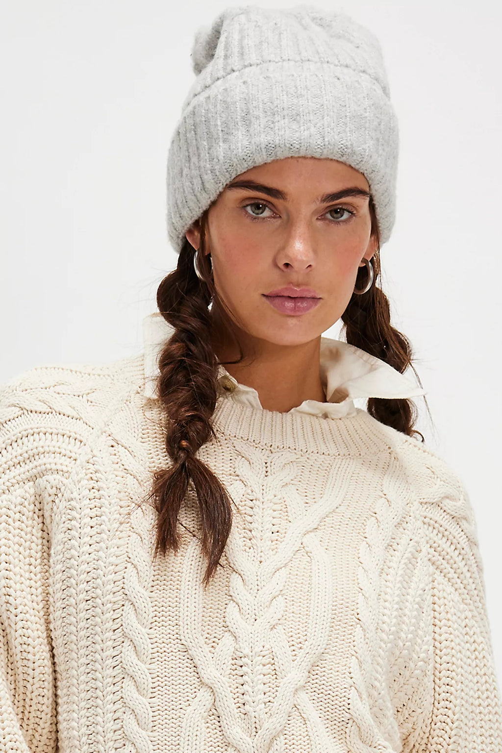 Cozy grey ribbed beanie with a relaxed fit, perfect for chilly weather in Long Island boutique fashion.