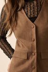 Faux suede sleeveless snap-front vest romper in rich brown features a tailored fit and pockets, perfect for stylish Long Island boutique fashion.