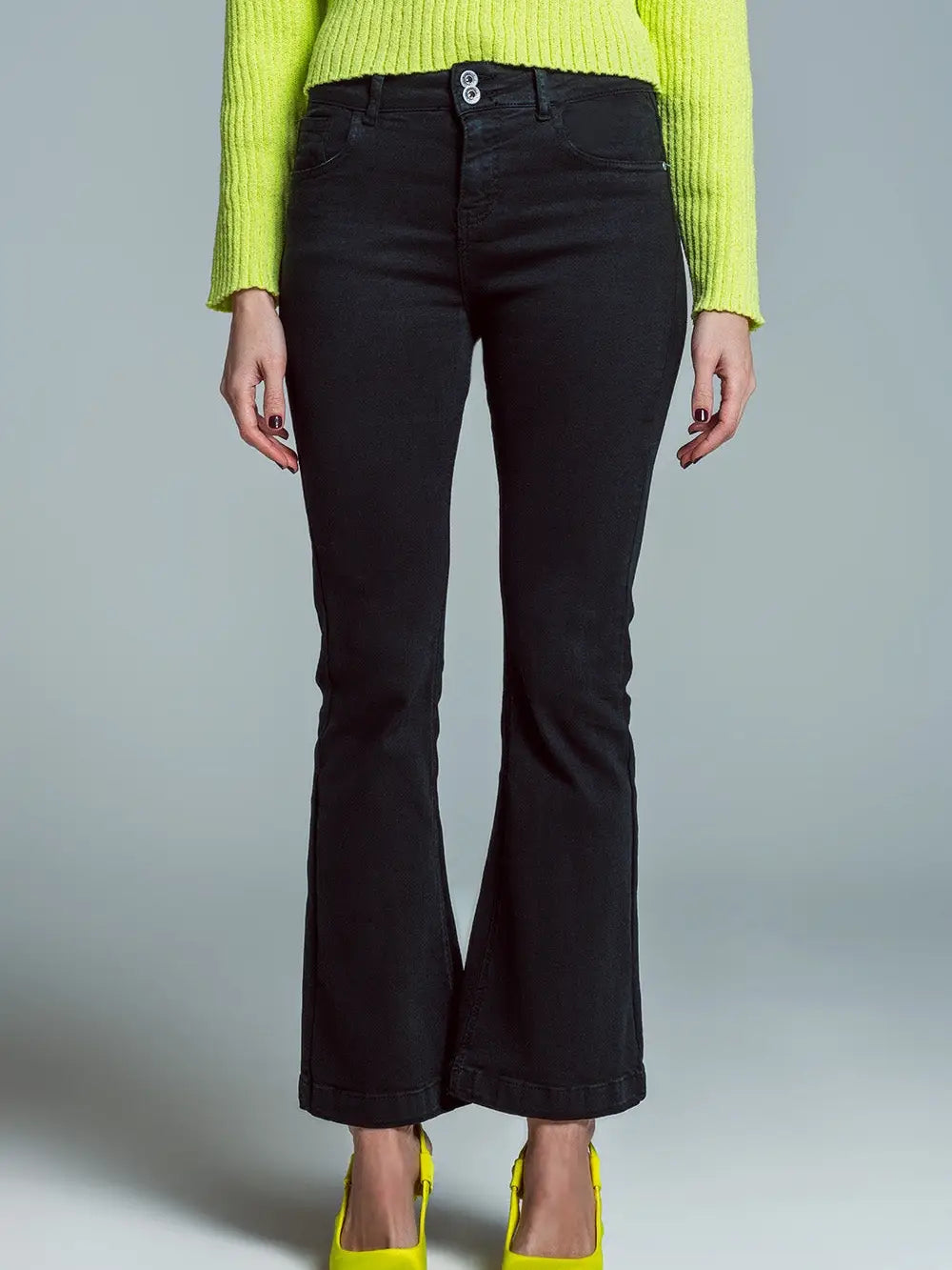 Model wearing black Skinny Flared Jeans with double button detail — stretch denim fit with modern flare, available at TandyWear Boutique in Commack, NY. front view