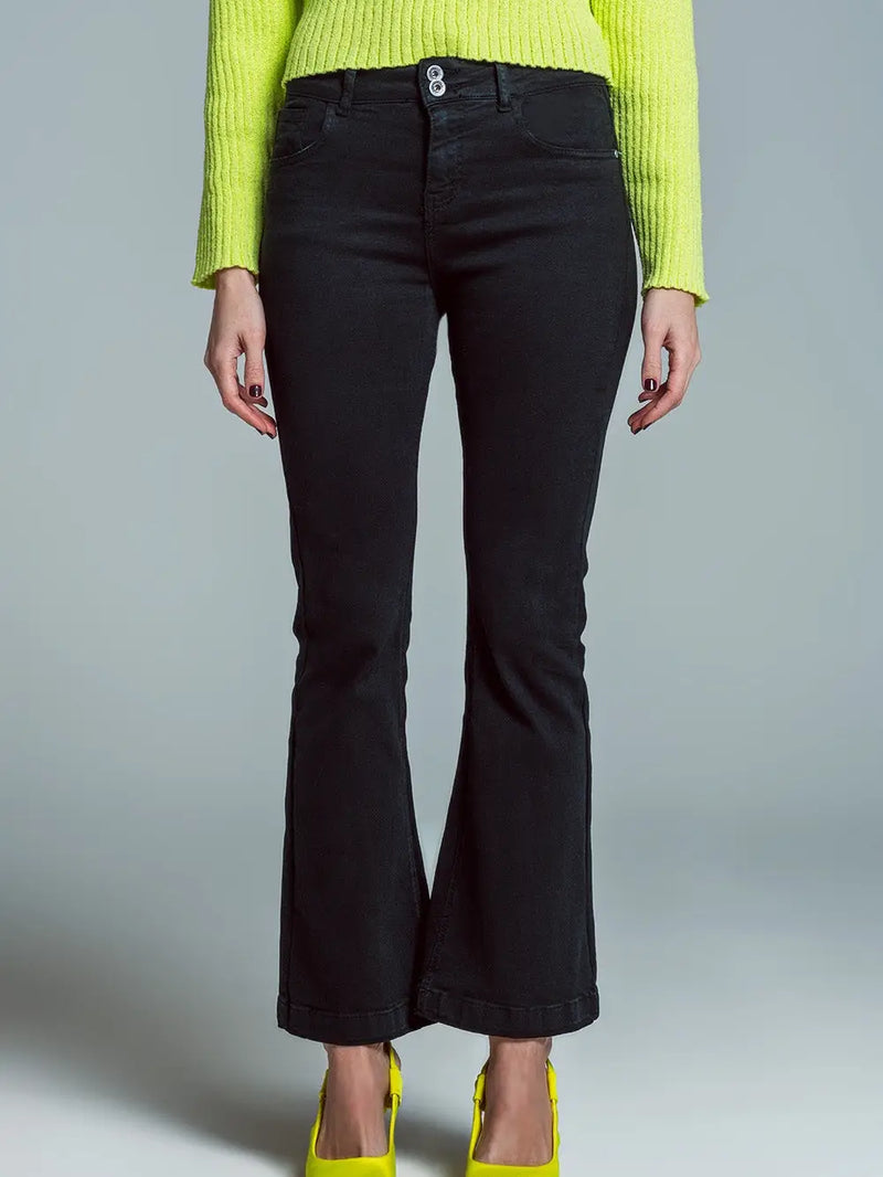 Model wearing black Skinny Flared Jeans with double button detail — stretch denim fit with modern flare, available at TandyWear Boutique in Commack, NY. front view