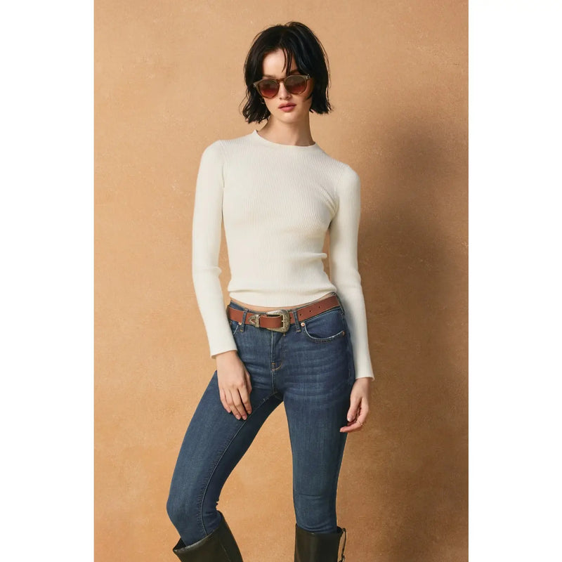 Lightweight ribbed crew neck sweater in cream, fitted style, paired with dark denim and a brown belt, perfect for Long Island boutique fashion.