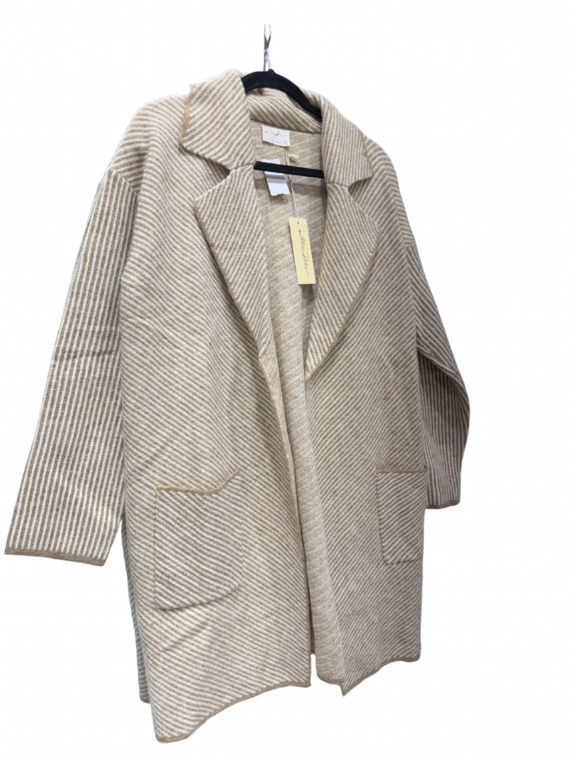 Soft, diagonal striped plush open coatigan in neutral tones, featuring a relaxed fit and two front pockets, perfect for Long Island boutique fashion.