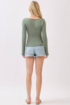Double-layer olive green square neck long sleeve top, perfect for layering, paired with denim shorts for a stylish Long Island boutique fashion look.