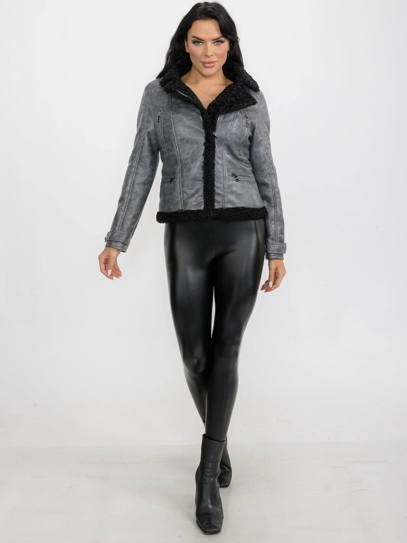 Stylish gray PU pleather jacket featuring a cozy fur-lined collar and front pockets, perfect for chic Long Island boutique fashion.