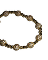 Gold stretch bracelet featuring pave bead accents and polished round beads, perfect for adding sparkle to any outfit in a Long Island boutique fashion.