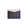 Sleek black credit card holder with a textured finish and a light pink top, ideal for stylish organization in Long Island boutique fashion.
