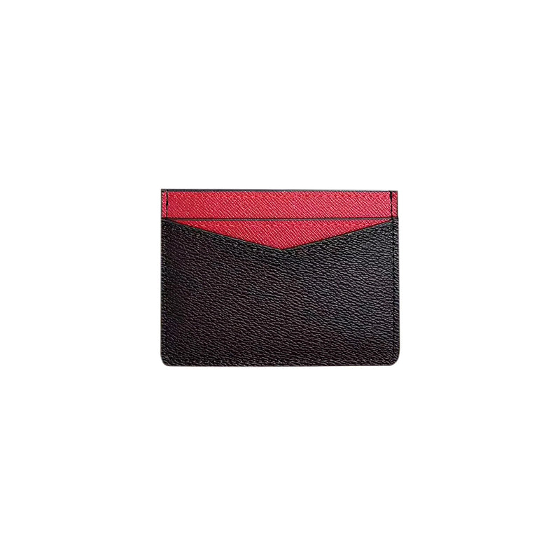 Sleek black credit card holder with a stylish red top detail, perfect for keeping essentials organized in Long Island boutique fashion.