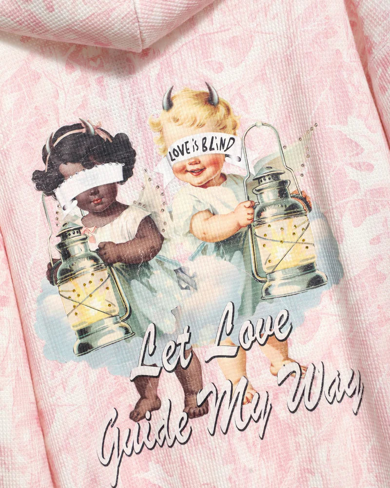 Feminine pink racer hoodie featuring a whimsical graphic of two children with lanterns and the phrase "Let Love Guide My Way," perfect for Long Island boutique fashion.