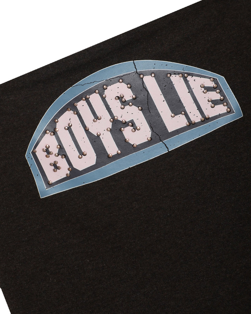 Black tube top featuring a bold "BOYS LIE" graphic with rhinestone accents, perfect for trendy looks at a Long Island women's boutique.