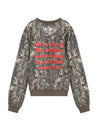 Camouflage crewneck sweatshirt featuring bold red text stating "We're sorry! The number you're trying to reach has moved on!" for Long Island boutique fashion.