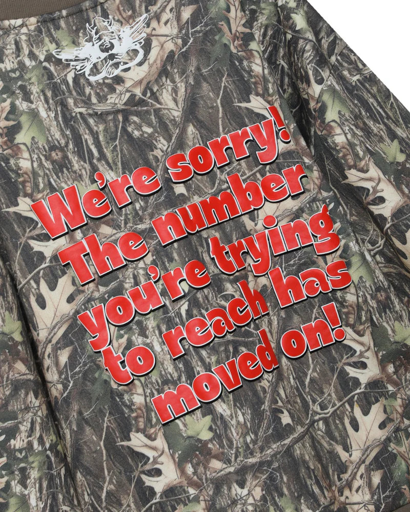 Camouflage crewneck sweatshirt featuring bold red text that humorously states, perfect for casual wear from this Long Island boutique fashion.