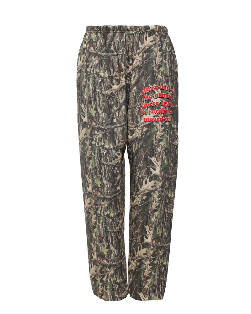 Camo pants featuring an elastic waistband and bold red printed text, ideal for casual wear in Long Island boutique fashion.
