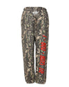 Camo-print pants featuring an elastic waistband and bold "1-800 BOYS LIE" text, perfect for trendy Long Island boutique fashion.