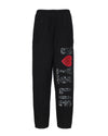 Black Kimmy pants featuring a relaxed fit, playful leopard print, and bold "Boys Lie" graphic with a red heart, embodying Long Island boutique fashion.