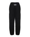 Relaxed black jogger pants featuring a unique embroidered design on the back, perfect for casual wear in Long Island boutique fashion.