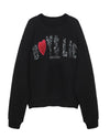 Black crewneck sweatshirt featuring bold leopard print lettering and a red heart, perfect for Long Island boutique fashion lovers.