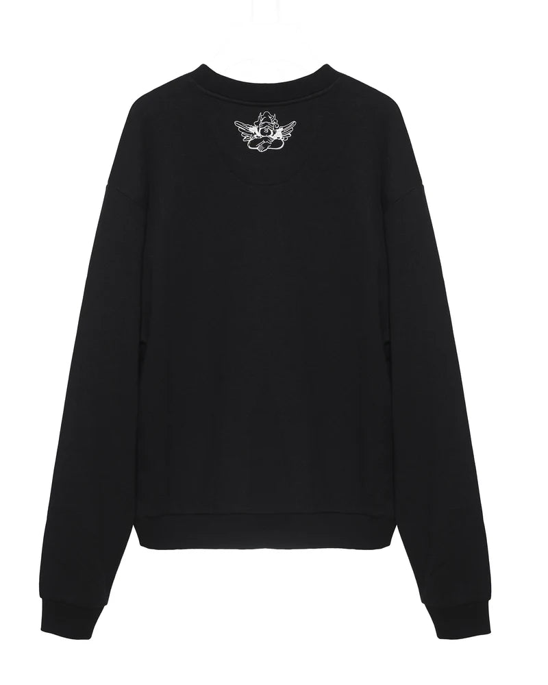 Cozy black crewneck sweatshirt featuring long sleeves and a playful graphic logo on the back, perfect for Long Island boutique fashion.