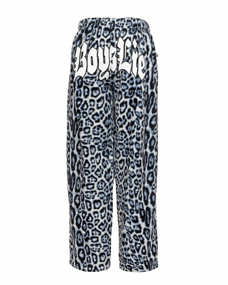 Relaxed-fit, fleece pants featuring a bold blue and black cheetah print with "Boys Lie" graphic on the back, perfect for Long Island boutique fashion.