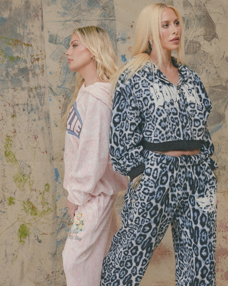 Leopard-print Alex pants with a relaxed fit, perfect for casual wear, embody trendy Long Island boutique fashion.