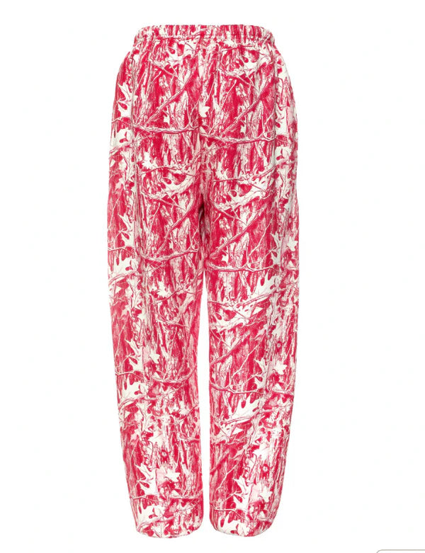 Red camo pants with an elastic waistband and loose fit, perfect for a trendy look in Long Island boutique fashion.
