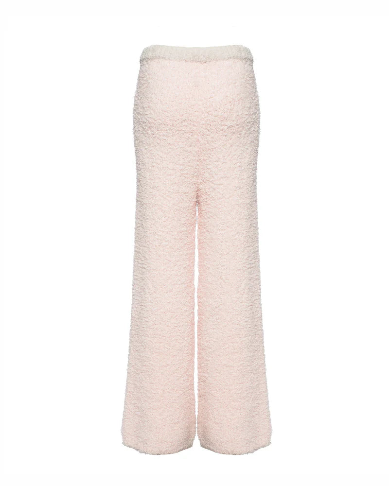 Soft pink cozy sweatpants with a fluffy texture and relaxed fit, perfect for Long Island boutique fashion.