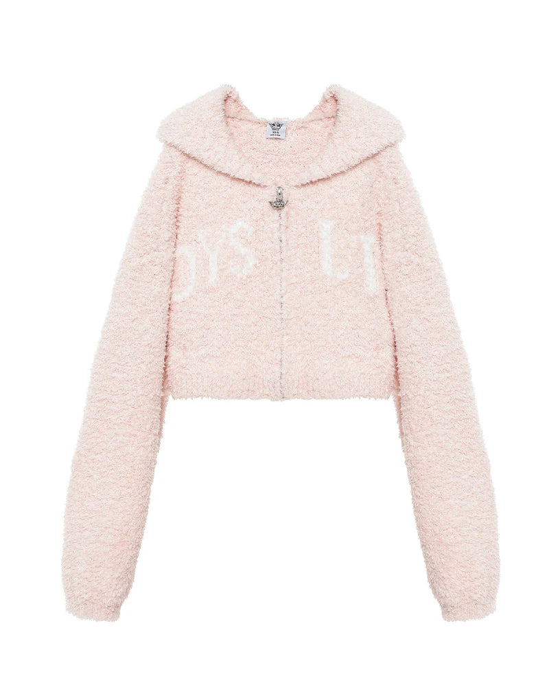 Soft pink cropped zip-up hoodie with a cozy texture and oversized collar, perfect for Long Island boutique fashion style.