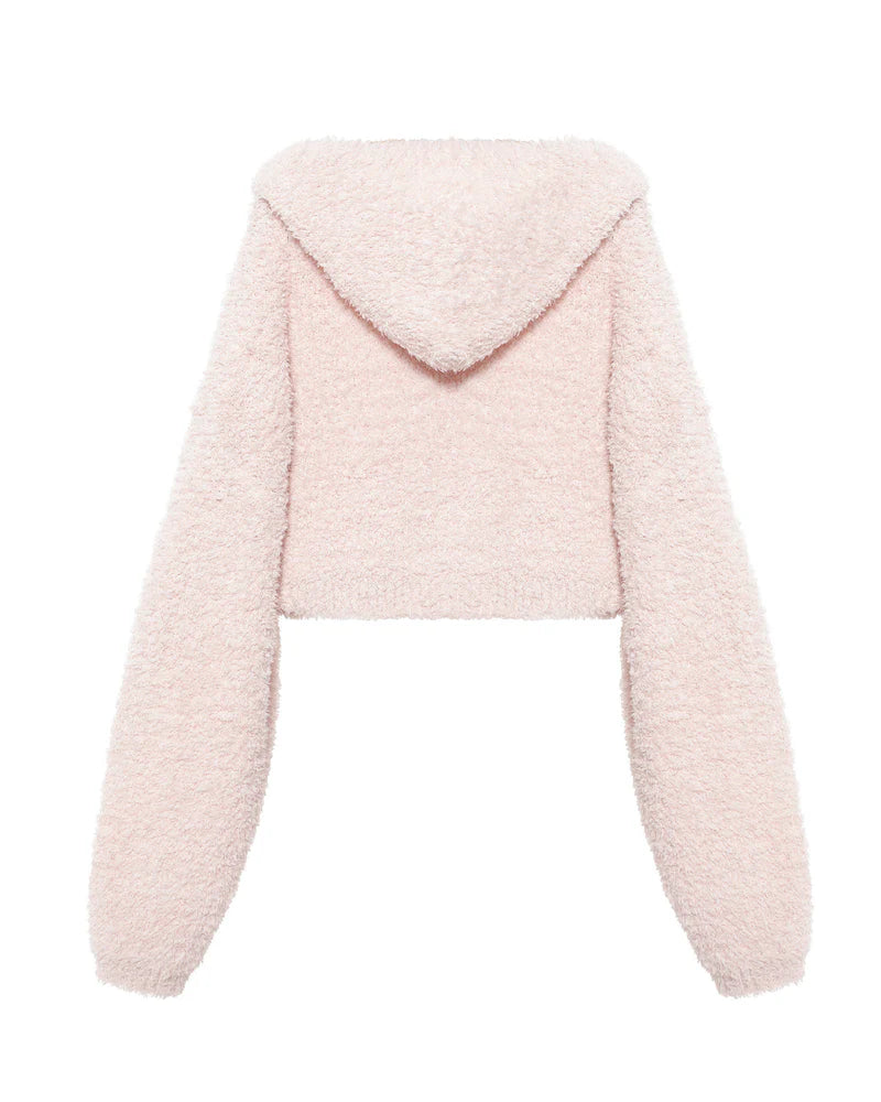 Soft pink cropped zip-up hoodie with a cozy texture and oversized collar, perfect for Long Island boutique fashion style.