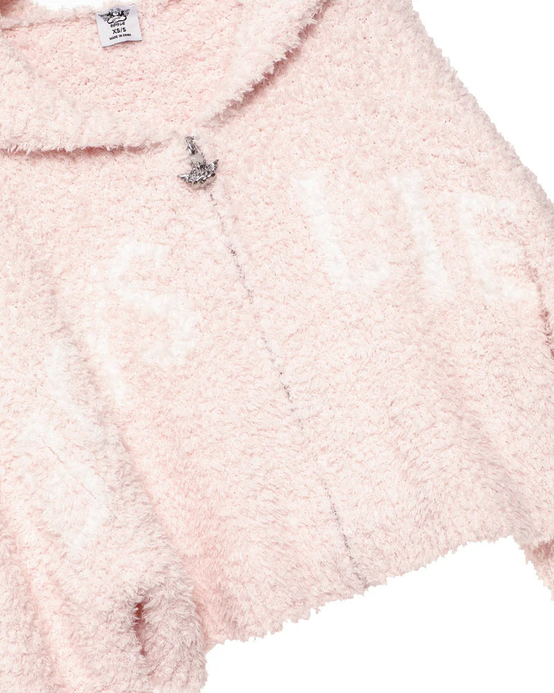 Soft pink zip-up hoodie featuring a cozy, textured finish and a subtle logo, perfect for casual Long Island boutique fashion.