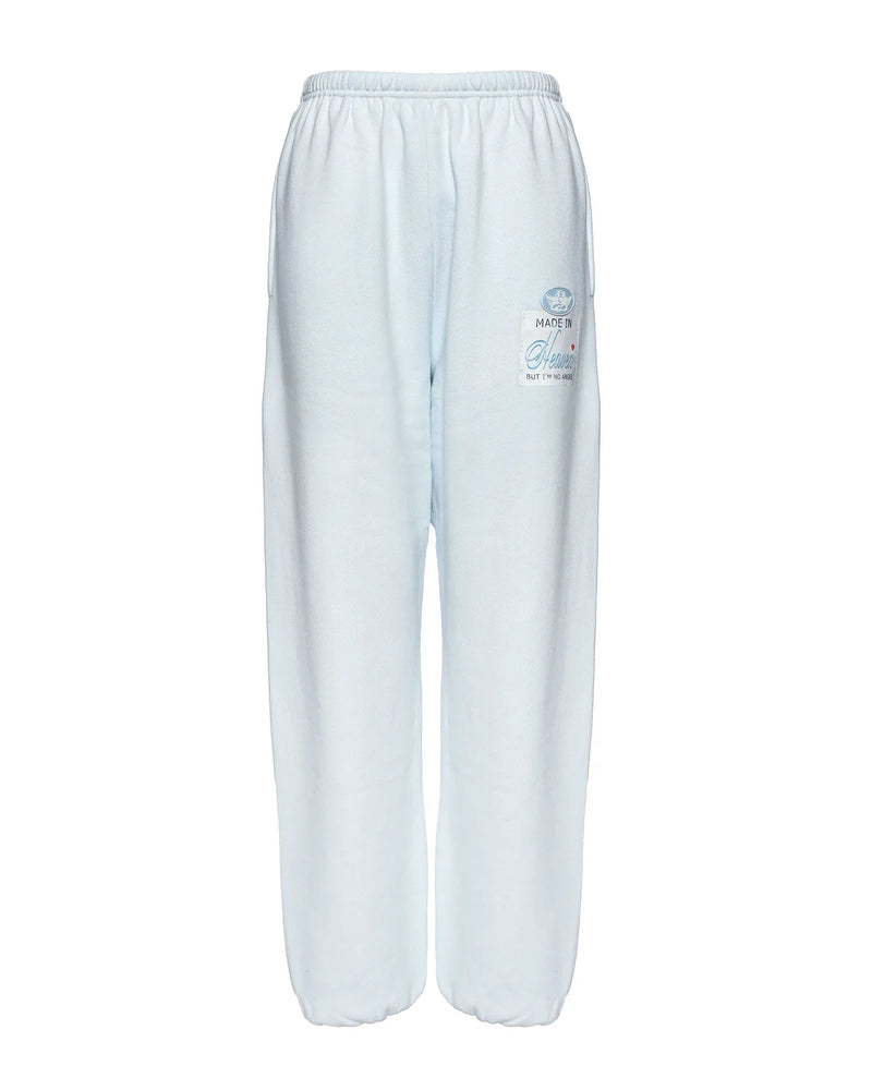 Light blue, relaxed-fit Kimmy pants with an elastic waistband and subtle logo detail, perfect for lounging in Long Island boutique fashion.