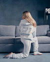 Light gray racer hoodie featuring "MADE IN HEAVEN" and heart graphics, perfect for cozy Long Island boutique fashion style.