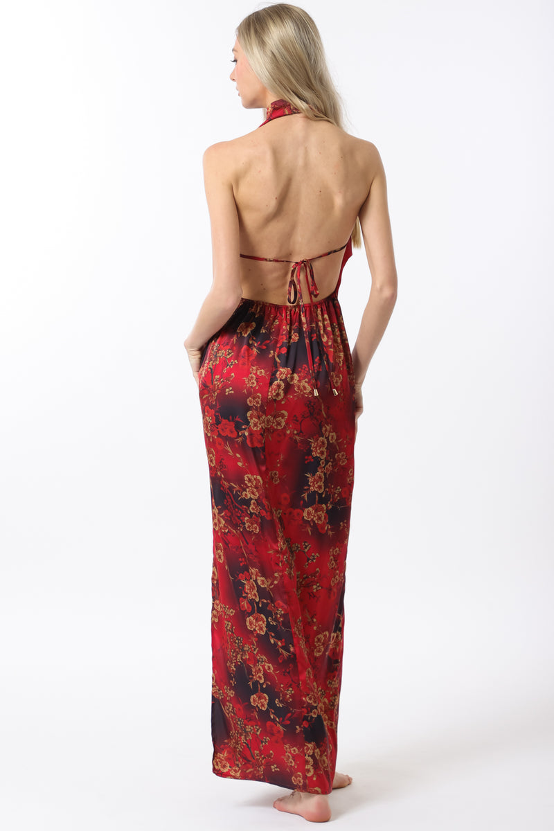Cowl neck maxi dress featuring flowing red fabric adorned with floral patterns and an open back, ideal for Long Island boutique fashion.