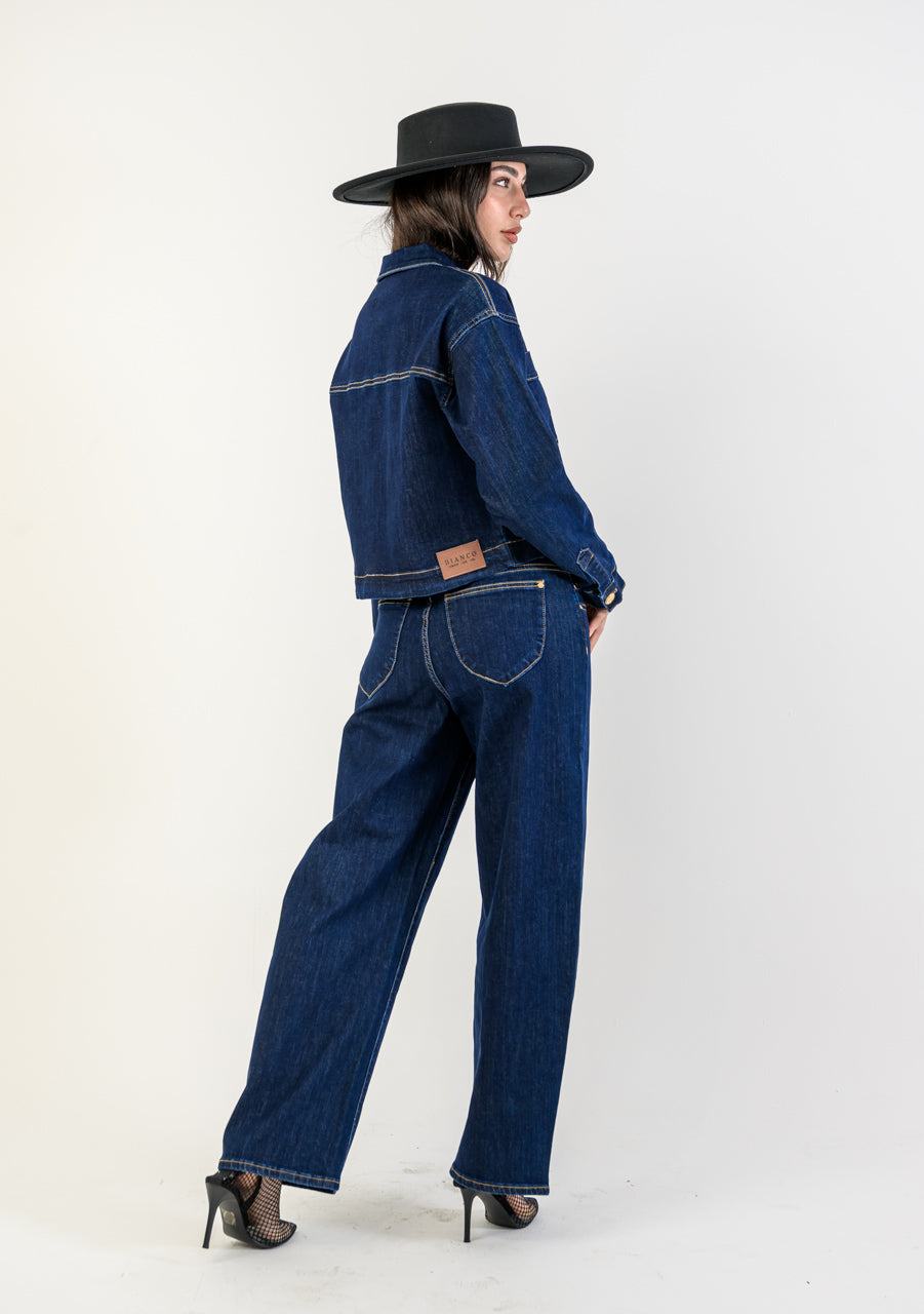 Women’s Bianco Gali cropped denim jacket in dark indigo with gold buttons — structured jean jacket outfit styled with matching denim pants, available at TandyWear Boutique Commack NY.