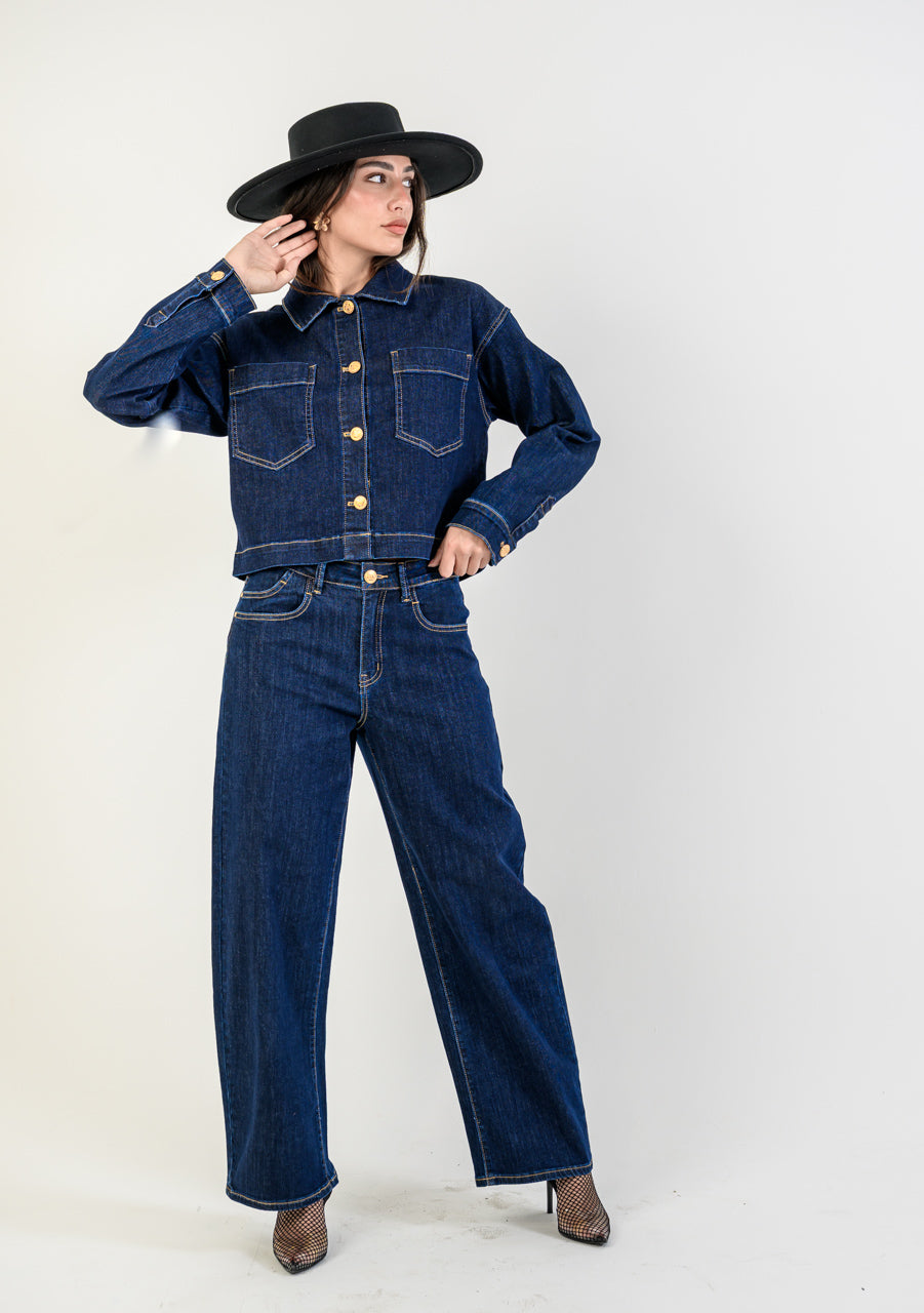 Women’s Bianco Gali cropped denim jacket in dark indigo with gold buttons — structured jean jacket outfit styled with matching denim pants, available at TandyWear Boutique Commack NY.