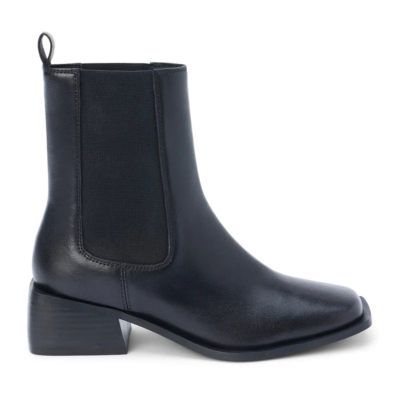 Chic black ankle boot with a sleek design, featuring elastic side panels and a low block heel, perfect for Long Island boutique fashion.