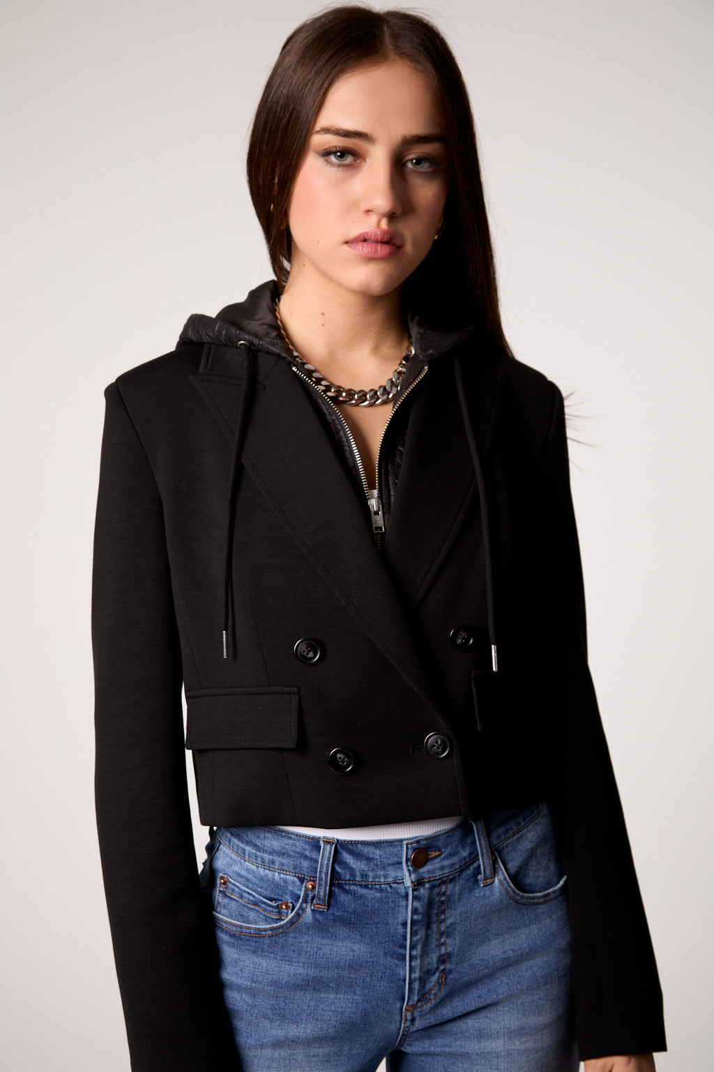 Cropped black double-breasted blazer with a tailored fit, styled for a chic look in Long Island boutique fashion.