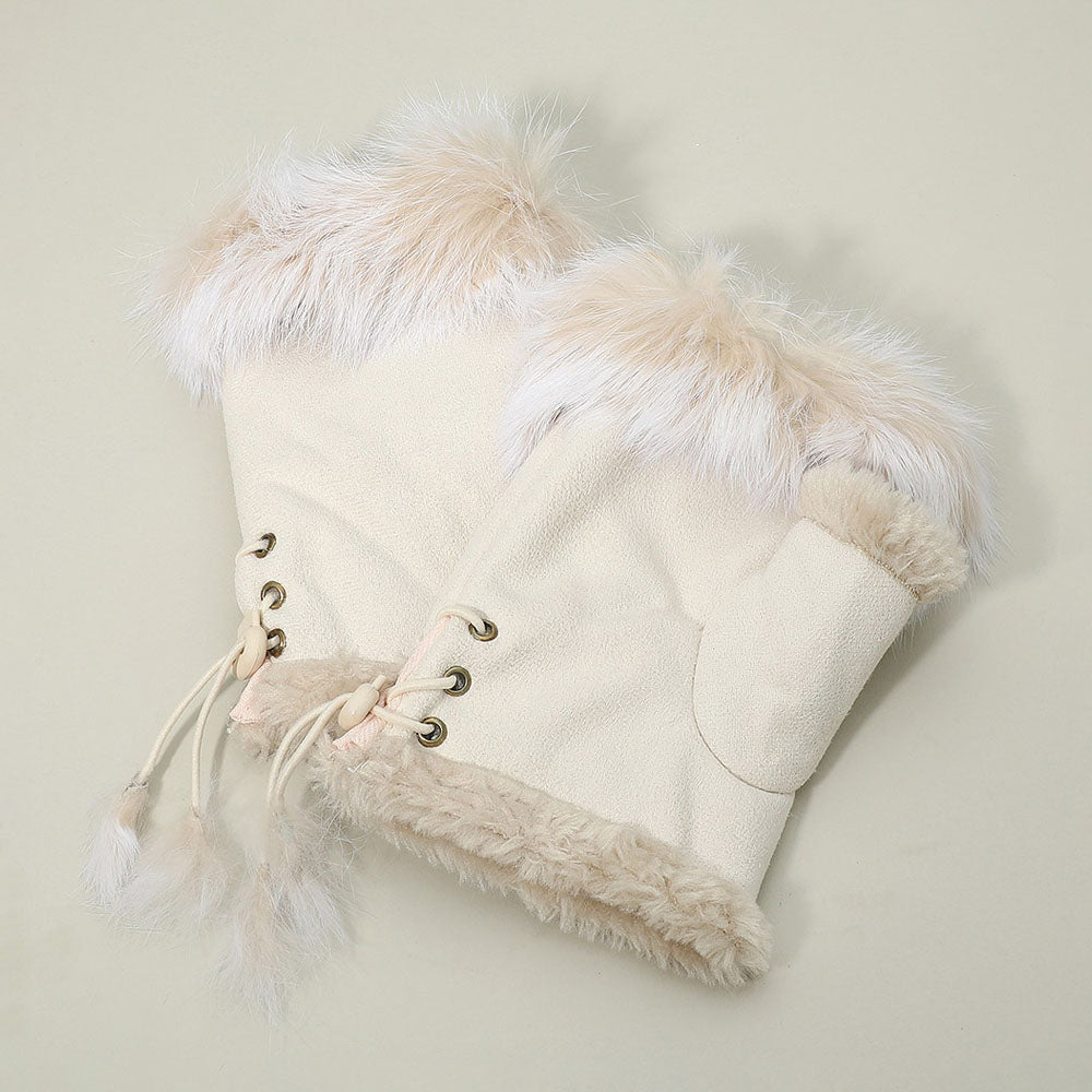 Soft tan fur fingerless cuffs with a fluffy cream trim offer cozy warmth, perfect for Long Island boutique fashion enthusiasts.