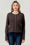 “Brown snap button cardigan with garment-dyed finish”
