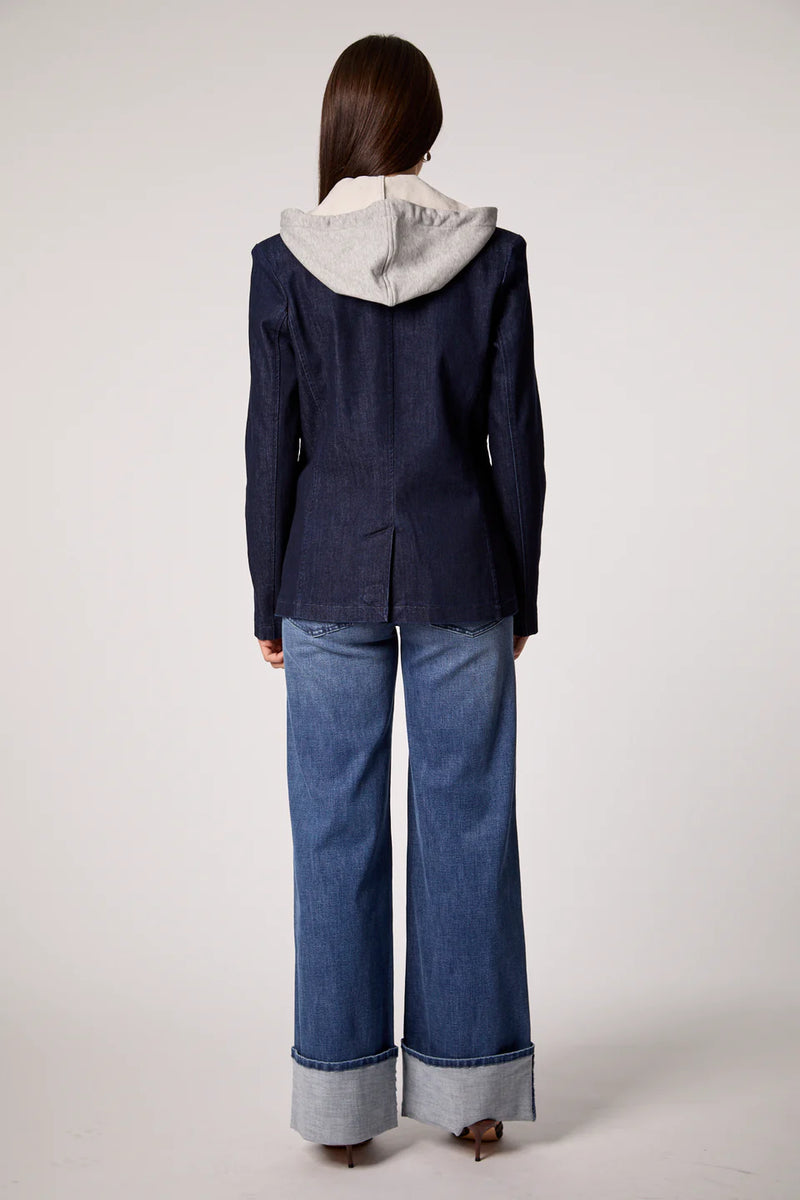 Tailored blue blazer with a removable gray hoodie insert, offering a chic blend of sophistication and casual comfort for Long Island boutique fashion.