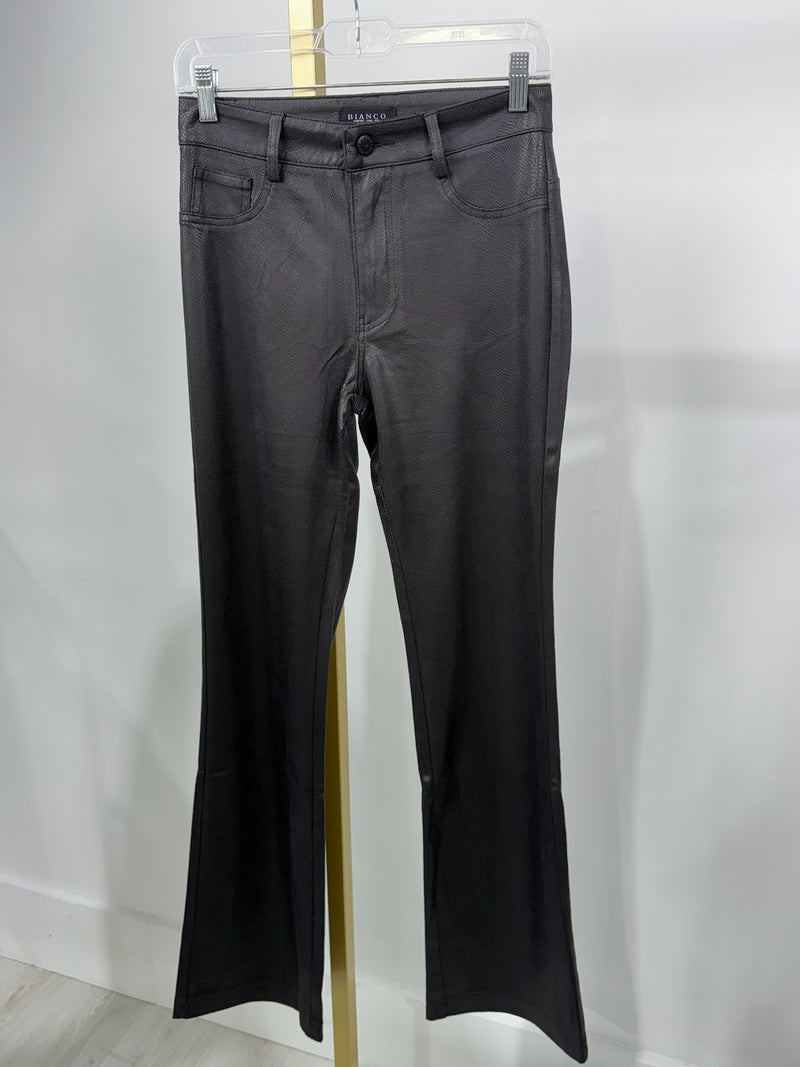 Sleek black flare trousers featuring a tailored fit and subtle texture, perfect for elevating any Long Island boutique fashion wardrobe.