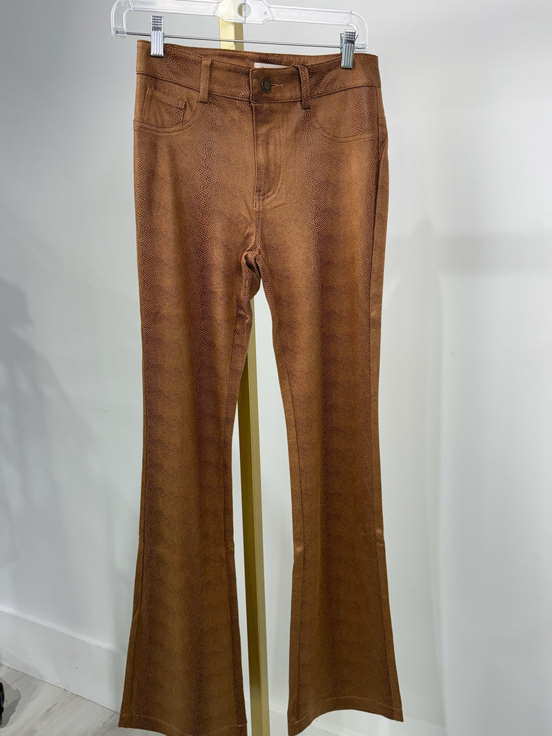 Flare trousers in a warm brown hue with a textured pattern, perfect for a chic look in Long Island boutique fashion.