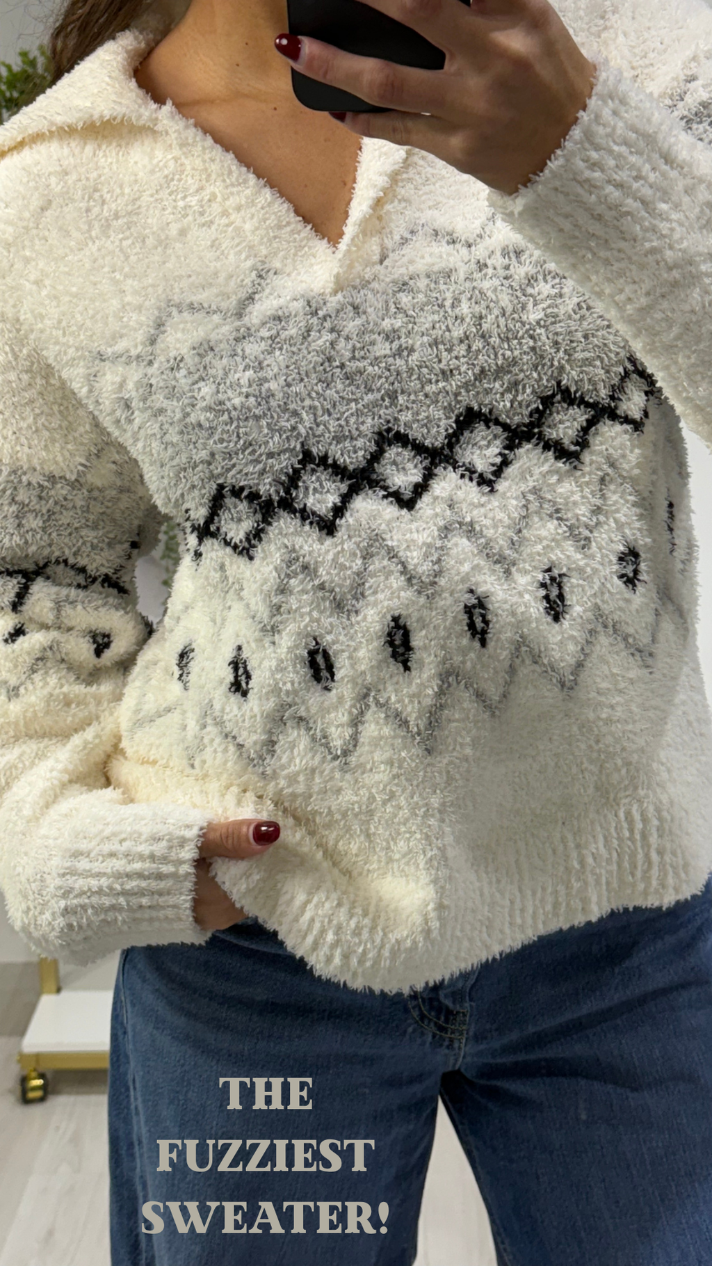 Cozy white Bernice sweater featuring a textured design in gray and black, perfect for Long Island boutique fashion.