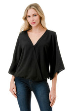 Ariella Surplice Bell Sleeve Top