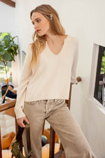 Exposed Seam Split Neck Sweater