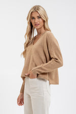 Exposed Seam Split Neck Sweater