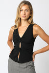 Black Carina tank top featuring a stylish twist front, keyhole detail, and a flattering fitted silhouette for trendy Long Island boutique fashion.