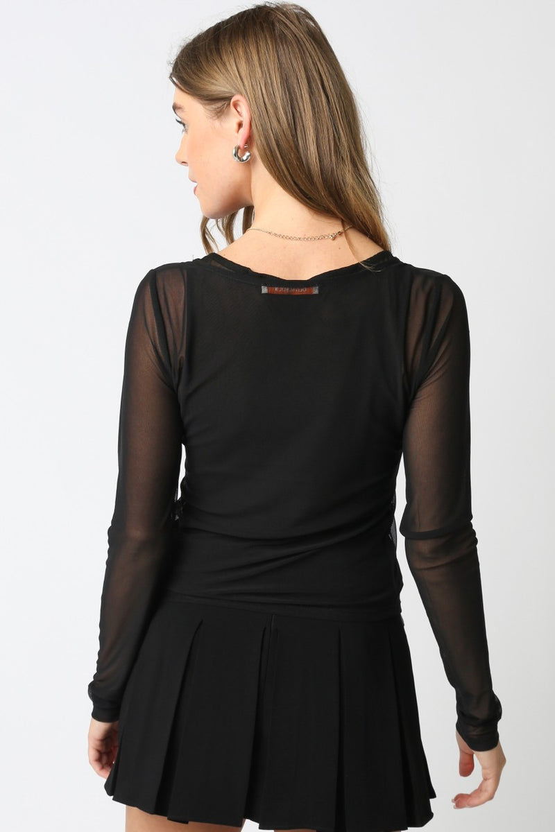 Black long-sleeve mesh top with a fitted silhouette and soft texture, perfect for layering in Long Island boutique fashion.